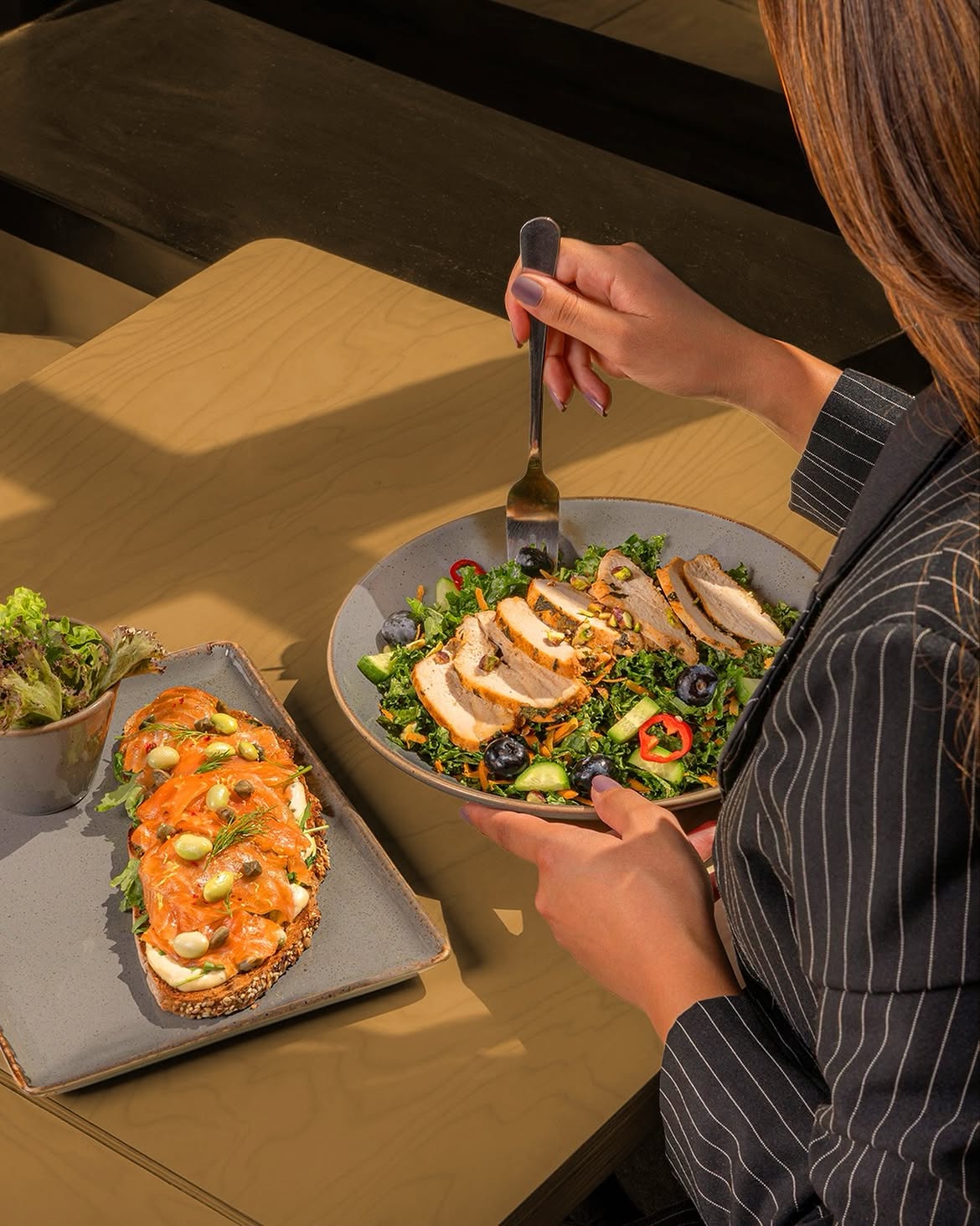 Emily's food — salmon toast and chicken salad